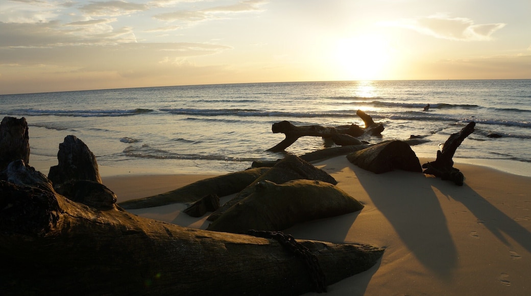 4WD is the only way to get around on Moreton Island, but Tangalooma Resort has an expanse of beach that is pedestrian only. It is blocked off either end by old logs - this is the Southern end at sunset.