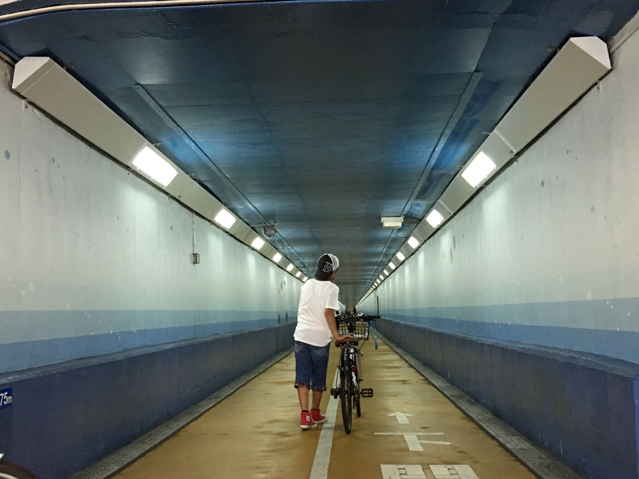 Kanmon Tunnel is an undersea tunnel which was planned in the 30s and completed in 1958 (due to the war) and opened in 1973. It is a roadway which linked Honshu (main island) and Kyushu (South Island) of Japan. 

Other than the roadway there is also a pathway for pedestrians and cyclists to walk across undersea (780m).

It was a v cool experience to walk undersea and to find even a marking below it which separate both the prefectures when one crosses one to the other. Also, am surprised to find cellular actually works here! For something planned in the last century, it is quite an engineering feat!

A very enjoyable experience as it is also very scenic along the coast once you exit the tunnel!

#ontheroad