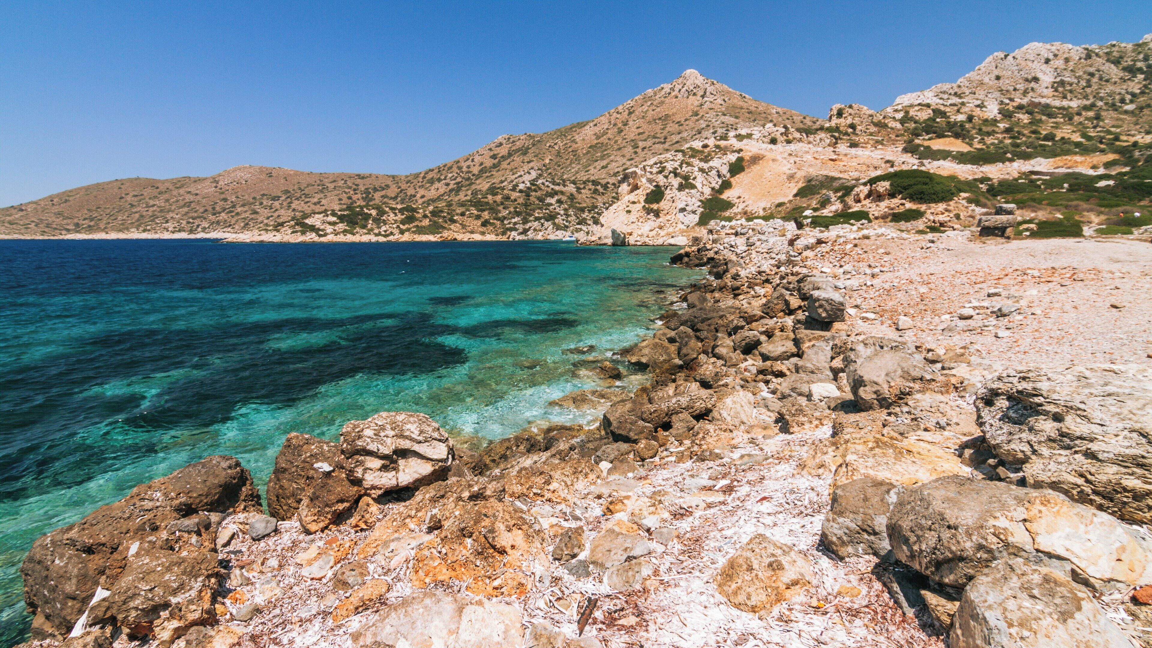 Explore the stunning coastal beauty of Knidos in Marmaris, Mugla, Turkey with its clear waters and rocky landscapes