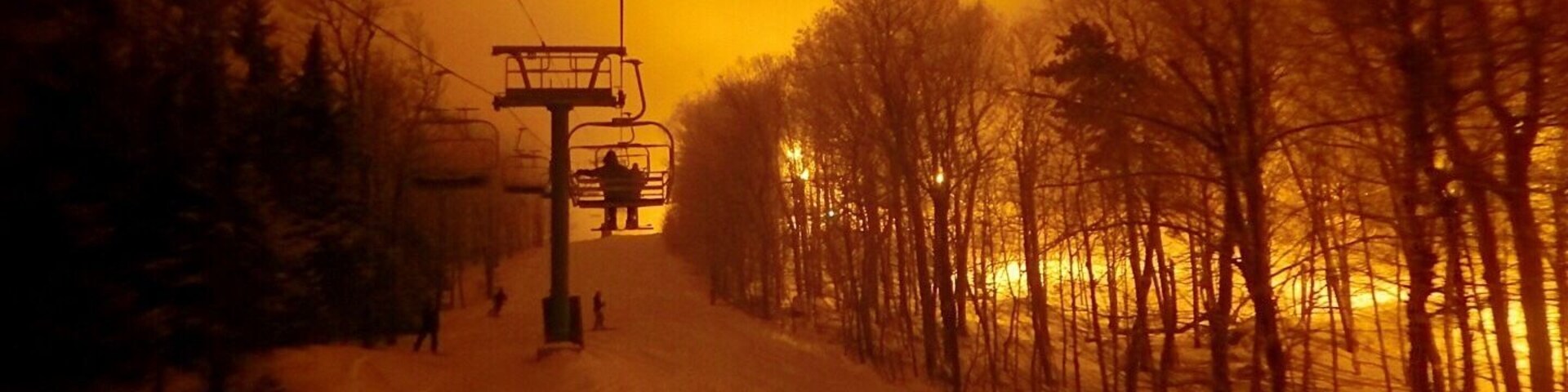 Some of the best night skiing in the eastern part of the U.S.  Lights radiate off of low hanging moisture rich clouds.
