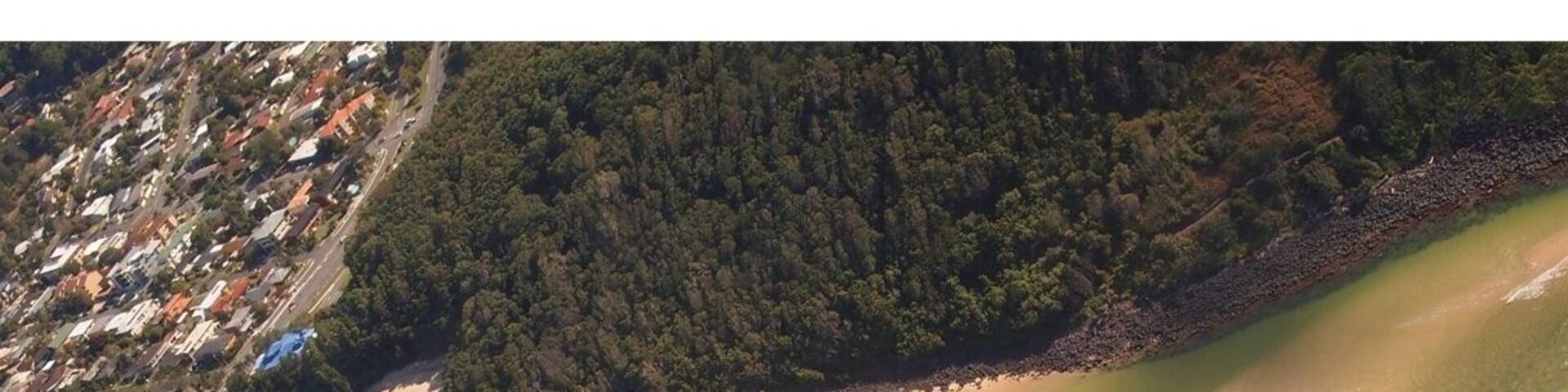 shoreline of GOLD COAST showing a foot path extending thru the Beach