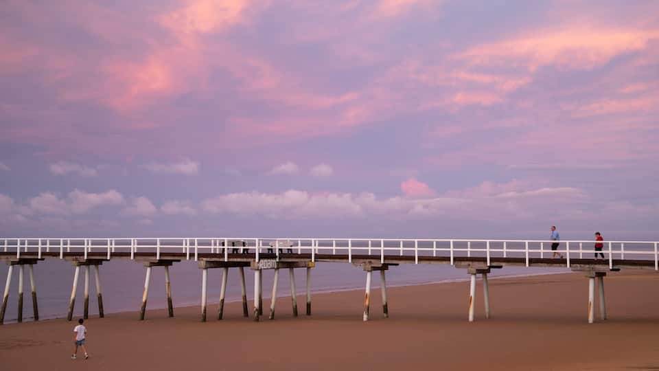 Torquay showing general coastal views, a sunset and a beach