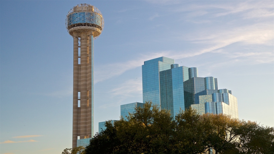 Dallas which includes a skyscraper, a city and a sunset
