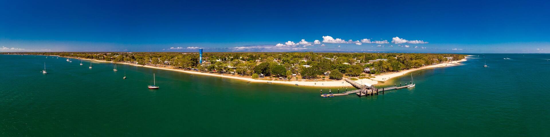 Aerial drone view of Bongaree Jetty on Bribie Island, Sunshine Coast, Australia