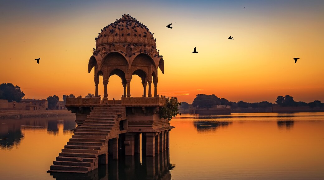 Ancient temple at Gadi Sagar (Gadisar) lake Jaisalmer Rajasthan, India at dawn.