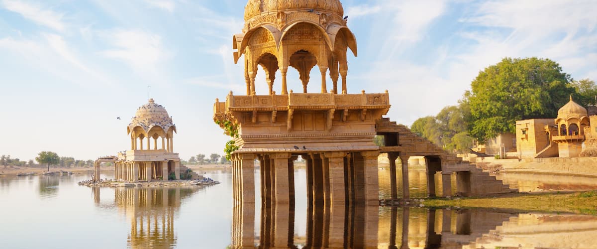 Indian landmarks - Gadi Sagar temple on Gadisar lake - Jaisalmer, Rajasthan, north India