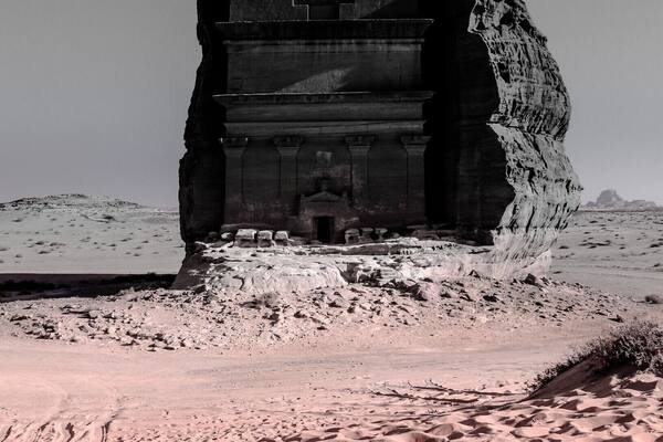 “Qasr al-Farid” means “the lonely castle”, so called because it stands completely isolated from the others. But despite its fanciful name, Qasr al-Farid is only a tomb. It was carved out of a single rock sometime in the first century A.D., but its facade was never finished which makes the tomb an interesting study. The heavily chiselled surface of the lower third documents how these tombs were fashioned from the top down. Qasr al-Farid is just one of ninety-odd such monumental tombs carved here during the heyday of the Nabataeans.