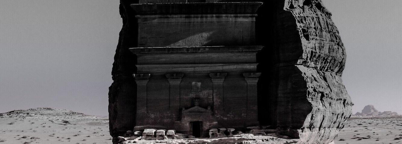 “Qasr al-Farid” means “the lonely castle”, so called because it stands completely isolated from the others. But despite its fanciful name, Qasr al-Farid is only a tomb. It was carved out of a single rock sometime in the first century A.D., but its facade was never finished which makes the tomb an interesting study. The heavily chiselled surface of the lower third documents how these tombs were fashioned from the top down. Qasr al-Farid is just one of ninety-odd such monumental tombs carved here during the heyday of the Nabataeans.