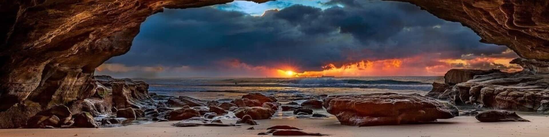 Not the ideal sunrise but definitely dramatic at caves beach sea cave