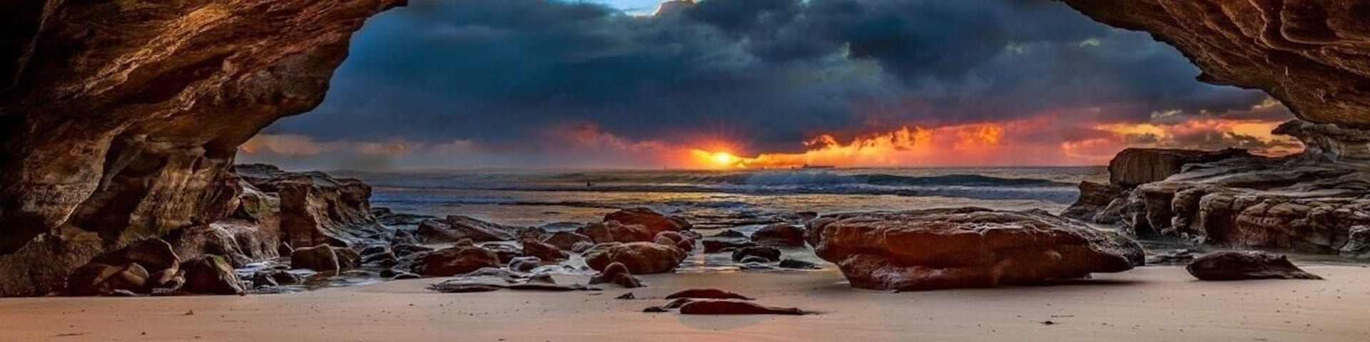 Not the ideal sunrise but definitely dramatic at caves beach sea cave