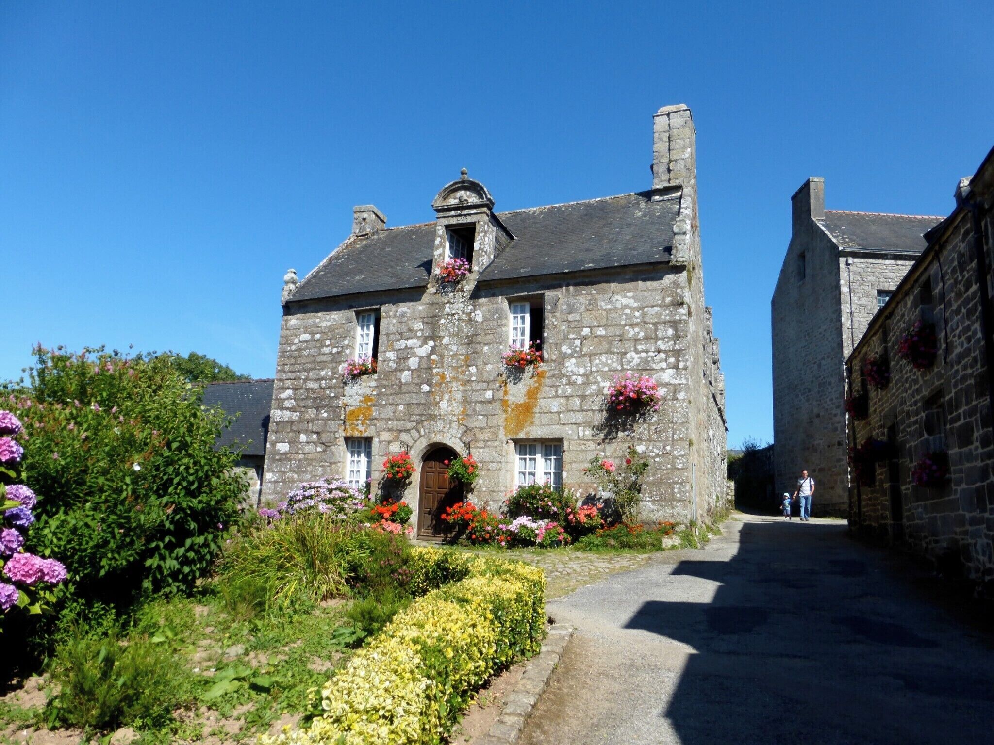 All cars must be left outside the village. Avoid the tourist shops and walk around the quiet streets.