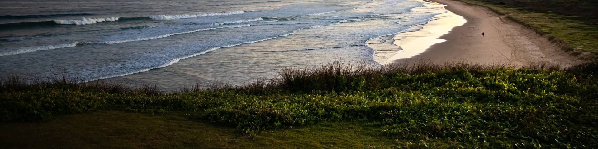 Scenic orange sunset at the beautiful unique Moonee Beach Nature Reserve. Look At Me Now Headland Walk, Coffs Harbour, NSW, Australia