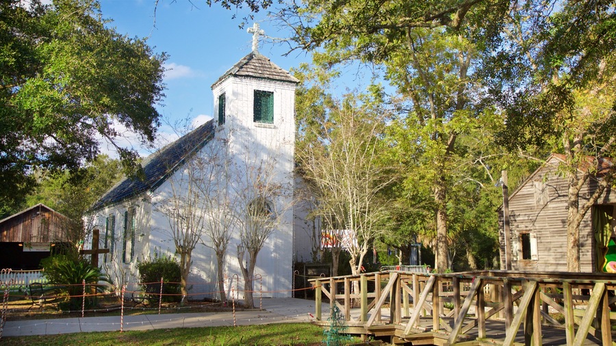 Acadian Village which includes a church or cathedral
