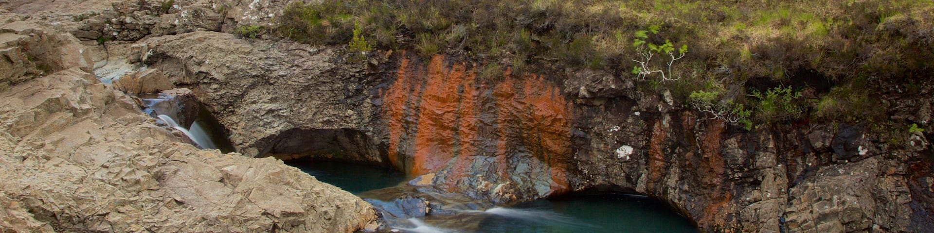 Isle of Skye showing tranquil scenes, mountains and a river or creek