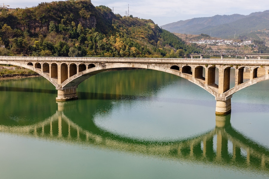 ancient stone bridge over the Bailong River, China