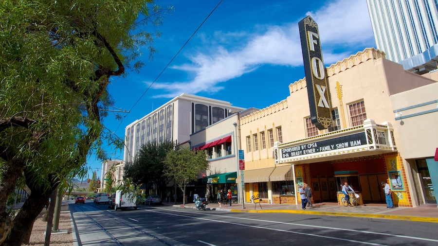 Fox Theatre featuring signage, heritage elements and theater scenes