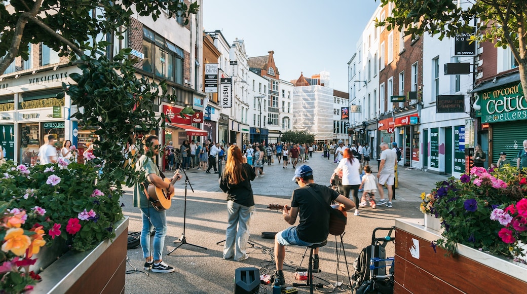 Grafton Street featuring music, street scenes and a city