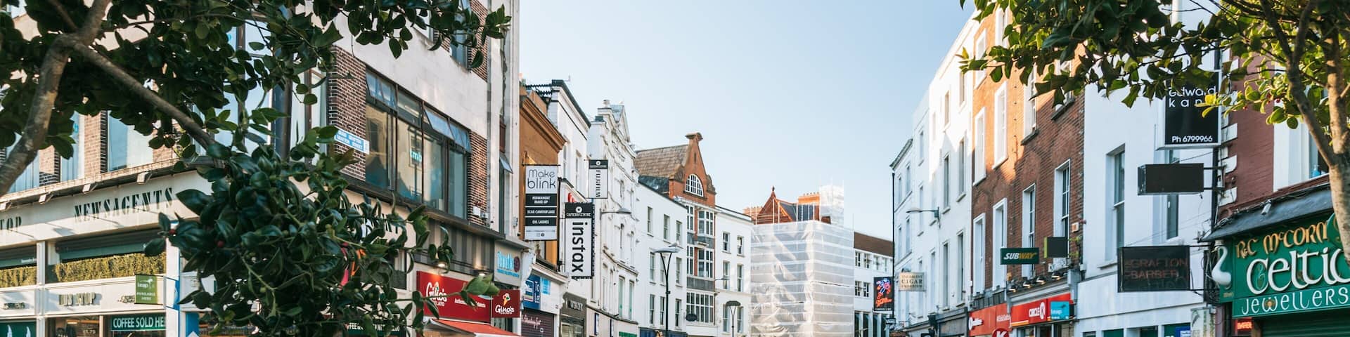 Grafton Street featuring music, street scenes and a city