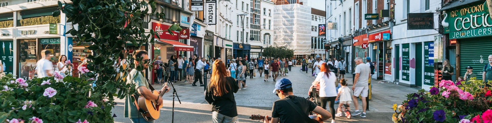 Grafton Street featuring music, street scenes and a city
