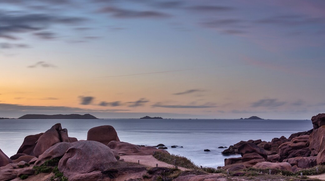 Panorama of the lighthouse of Ploumanach at sunset in Perros-Guirec, Côtes d'Armor, Brittany, France