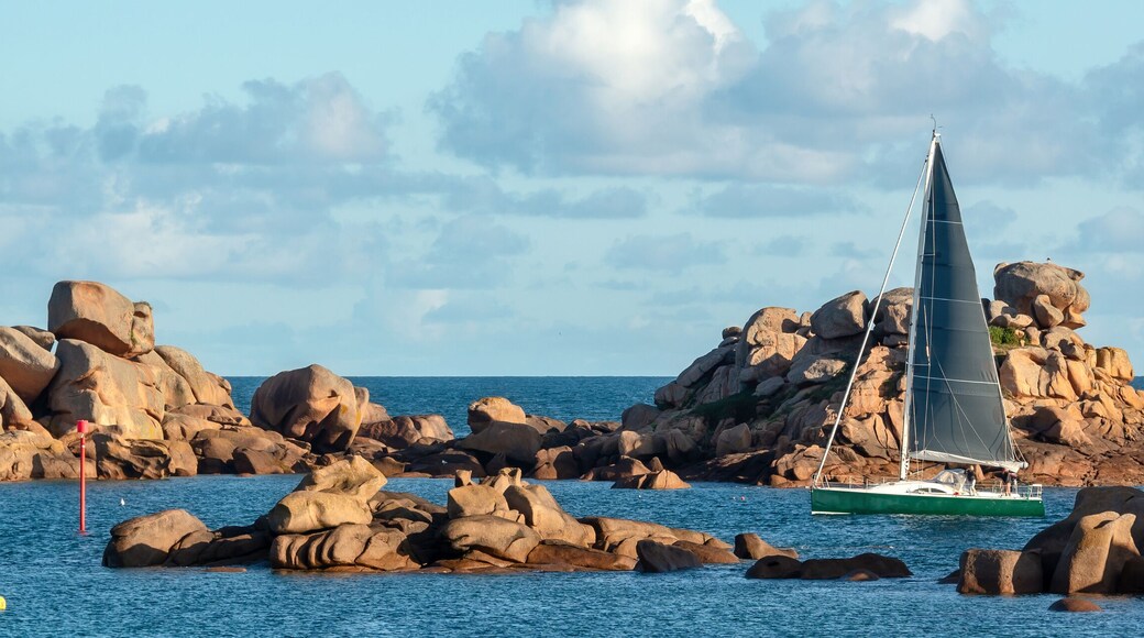 Sailing boat and the rocks of Ploumanach in Perros-Guirec, Côtes d'Armor, Brittany, France