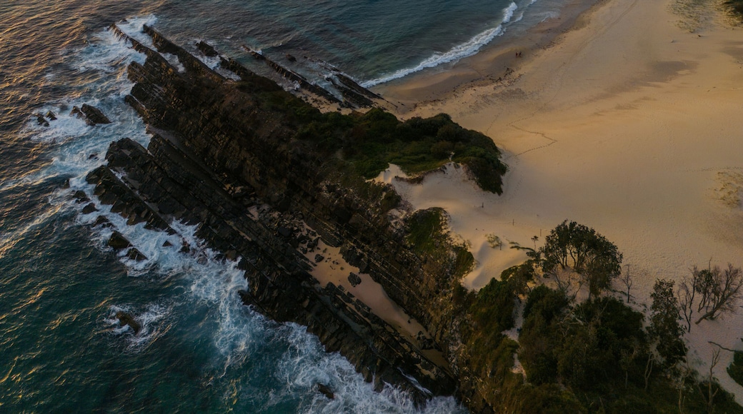 Aerial view of One Mile Beach, Forster, Australia with cloudy sky.