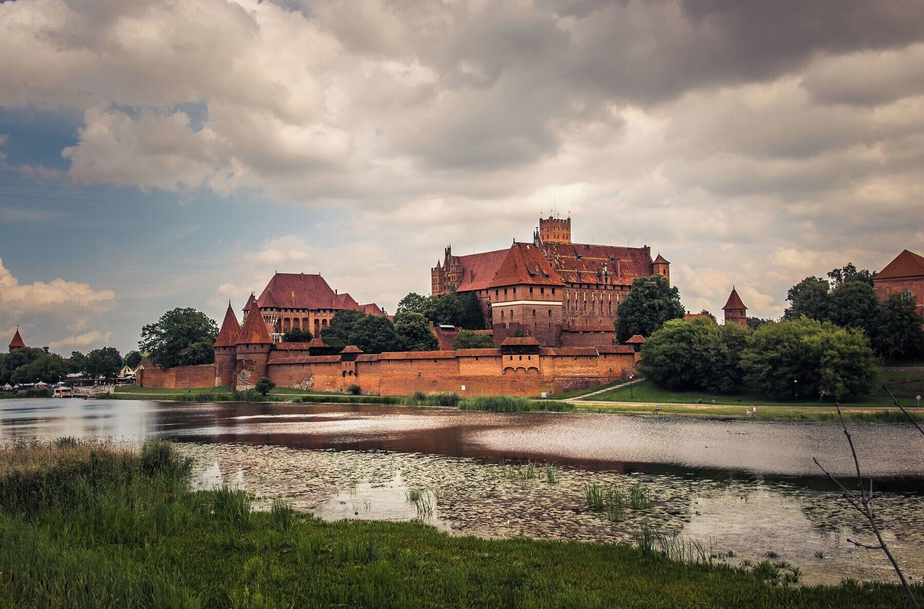 The Marienburg, headquarter of the Teutonic Order between 1270 and 1410. This picture-book medieval castle is the largest brickstone building in Europe. It is excellently preserved in the original style with great wall painting of saints and various knights of the order and their so-called Grandmasters.