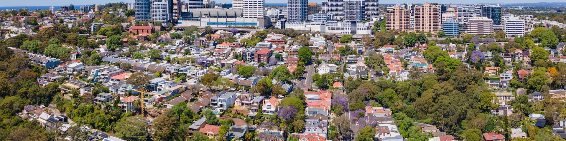 Panoramic aerial drone view of Bondi Junction, in east Sydney, NSW Australia, looking from above Double Bay on a sunny day