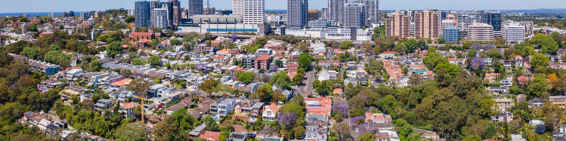 Panoramic aerial drone view of Bondi Junction, in east Sydney, NSW Australia, looking from above Double Bay on a sunny day