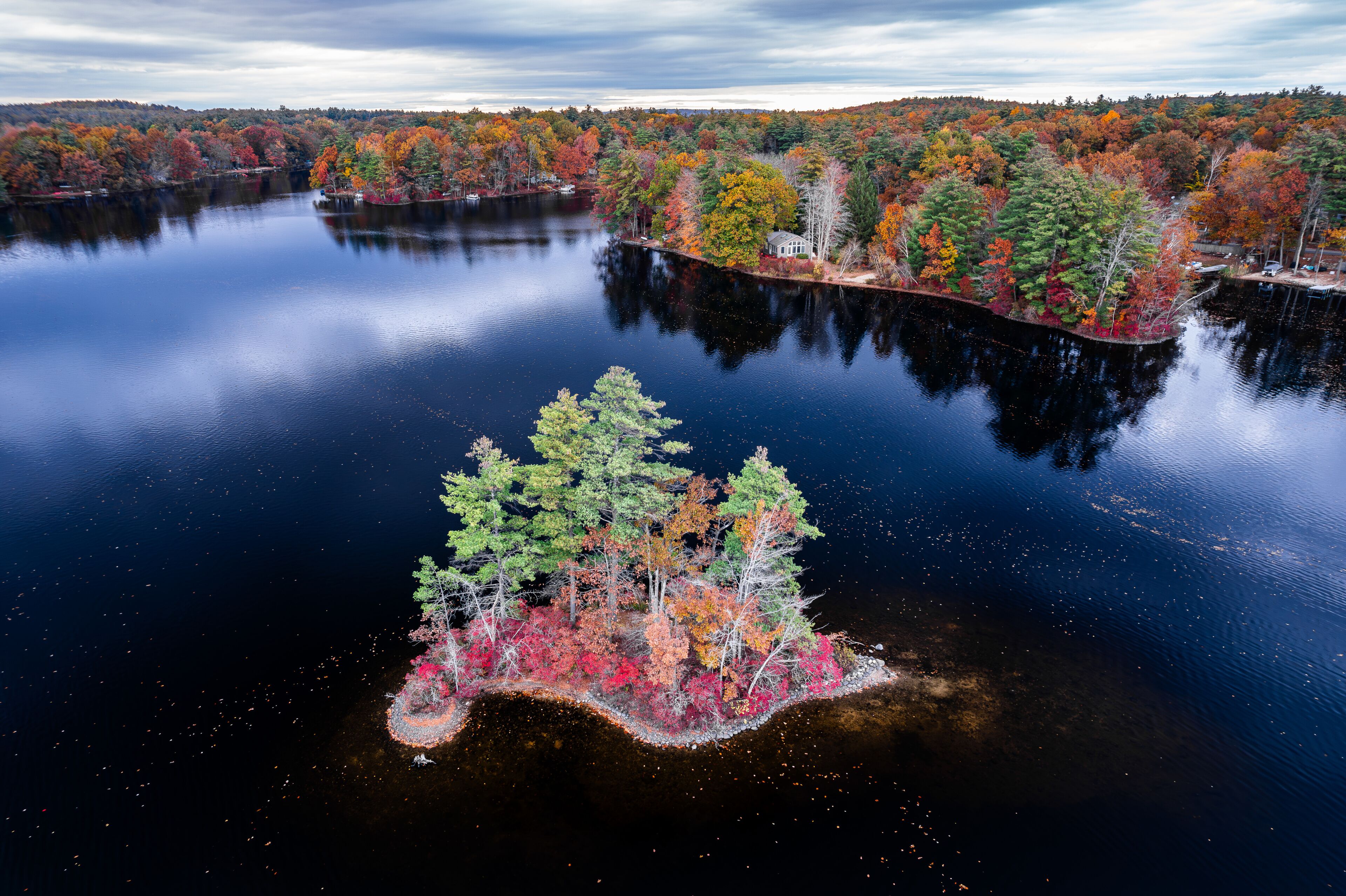 Aerial view of an island in lake during autumn 
-Hickory Hills Lake, Lunenburg, Massachusetts 