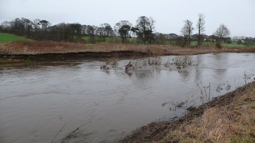 River Almond in spate About 8 feet higher than normal summer-level.