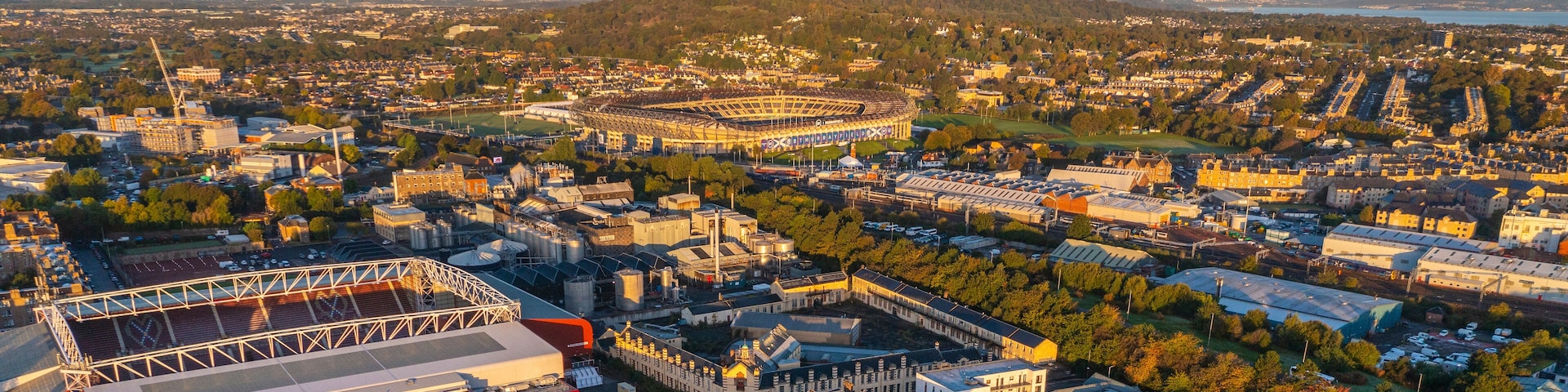 Aerial view of sunset over Murrayfield International Stadium and residential neighborhood in Gorgie, Edinburgh, Scotland, United Kingdom.