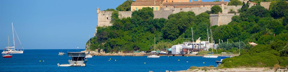 Route Napoléon showing a bay or harbor and a coastal town