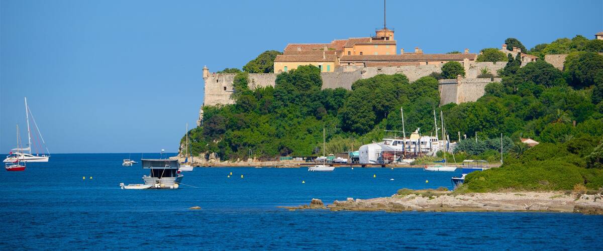 Route Napoléon showing a bay or harbor and a coastal town