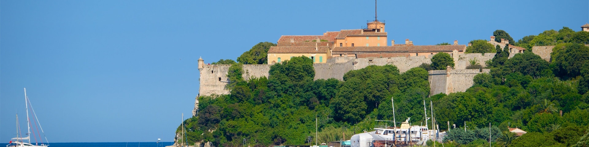 Route Napoléon showing a bay or harbor and a coastal town