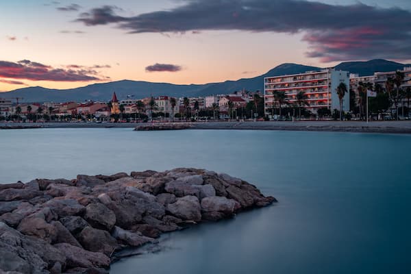 Romantic evening view of the French Riviera coastline from the Port of Cros-de-Cagnes.