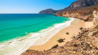 Al Fizayah Beach in Salalah is a hidden gem with its pristine white sand, crystal clear waters, and breathtaking mountainous. Secluded paradise of Oman offering a tranquil and unique beach experience.