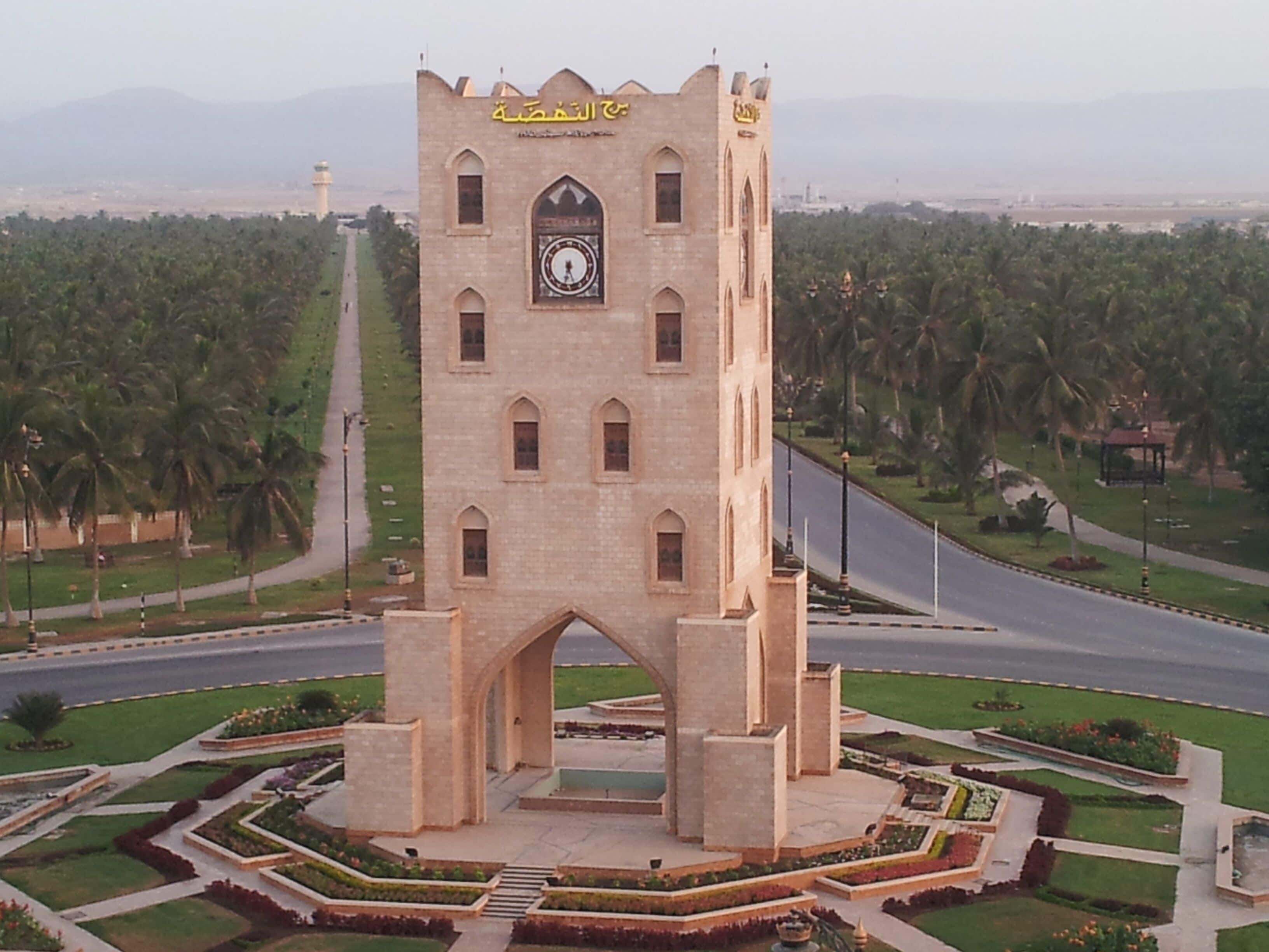 Roundabout of the old airport, tree palms park, coconut, amazing during monsoon season called Khareef ( translation in Arabic of Autumn season ), lights turn on during the night