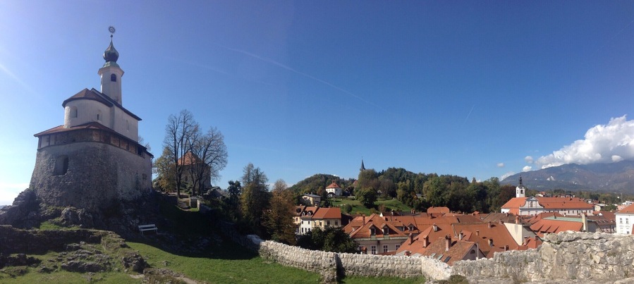 Kamnik is a small medieval town around 20 km north-east of Ljubljana. There are a couple of castles here, and the town is surrounded by mountains. Very beautiful.
Train is €2.58 each way; takes 40 minutes