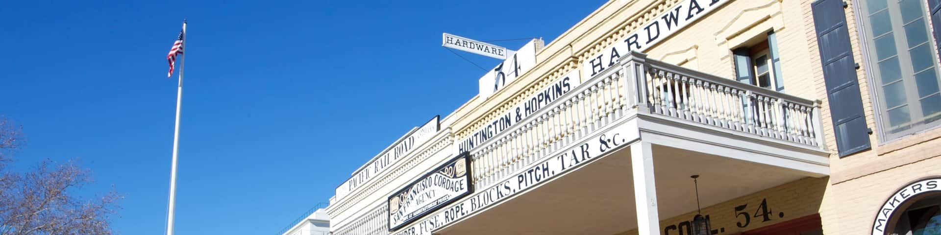 Old Sacramento featuring signage and heritage architecture