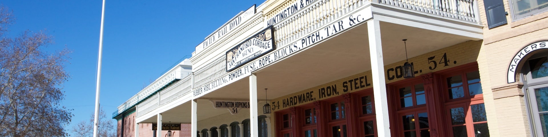 Old Sacramento featuring signage and heritage architecture