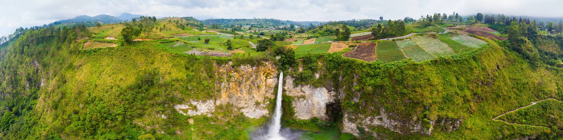 Aerial view Sipiso-piso waterfall in Sumatra, travel destination in Berastagi and Lake Toba, Indonesia.