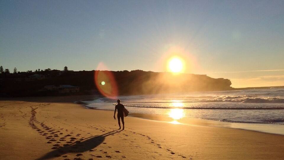 Curl Curl Beach is on Sydney's North Shore. You can walk along the boardwalk from the south and then over the headland to the north. There's good surf and a surf club at the north end. You'll find a coffee shop at the south end of the beach. This beach is much less crowded than nearby spots such as Manly