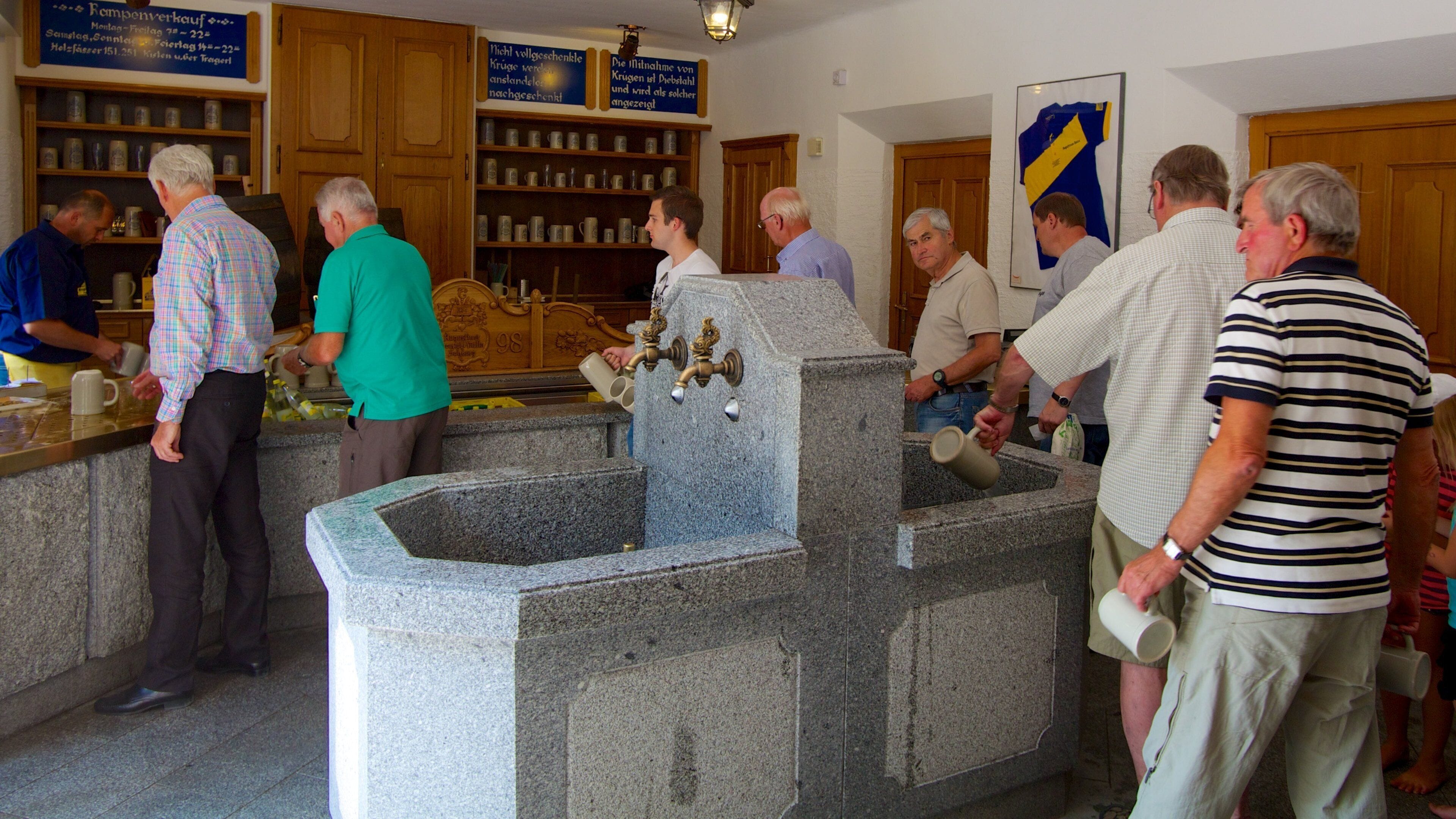 Augustiner Brewery which includes drinks or beverages, interior views and a bar