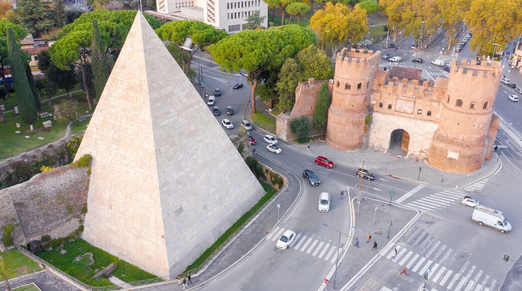 Aerial view of Ostiense square and Pyramid of Cestius, a Roman Era pyramid located in Rome, Italy.