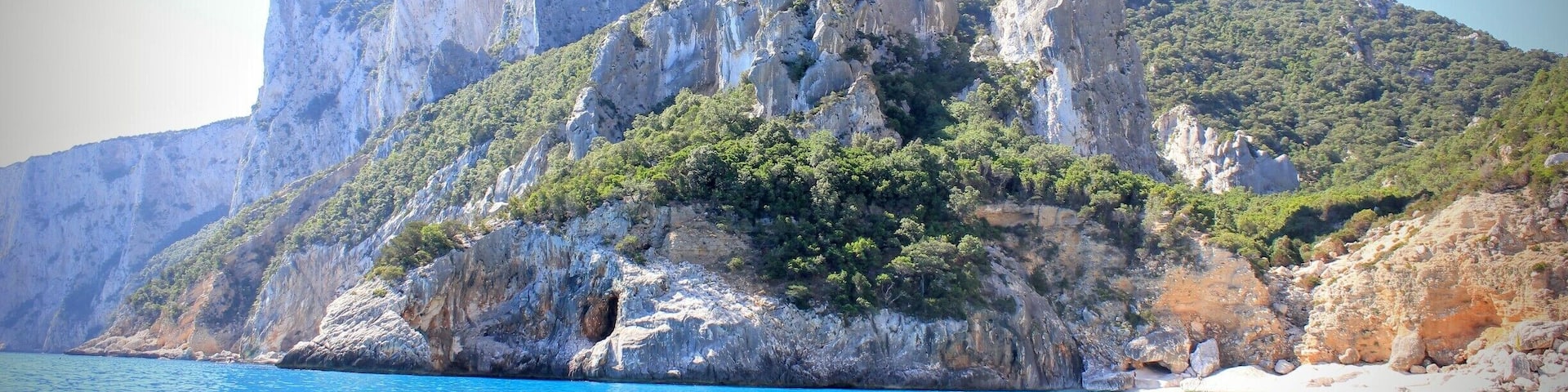 A beautiful beach, the water is crystal clear like pool water. You have to rent a boat to reach that beach! It's worth every cent