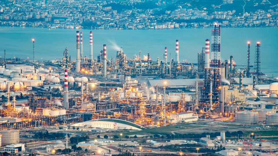 Oil refinery factory on the sea in Izmit, Turkey. Petrochemical plant structure on manufacturing oil refinery. Tupras Izmit petroleum refinery. Tupras is Turkey's largest oil refinery.