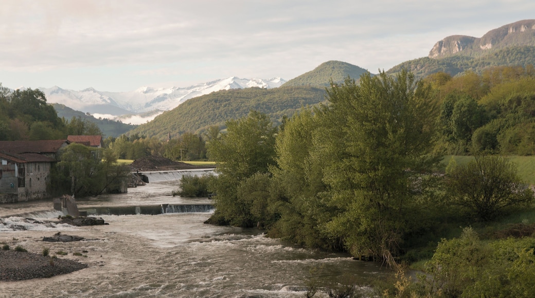 View, from the bridge over the Salat, on a few peaks of the Pyrenees of Ariège : Mount Valier ,Peak of Montau, Peak Soubirou.