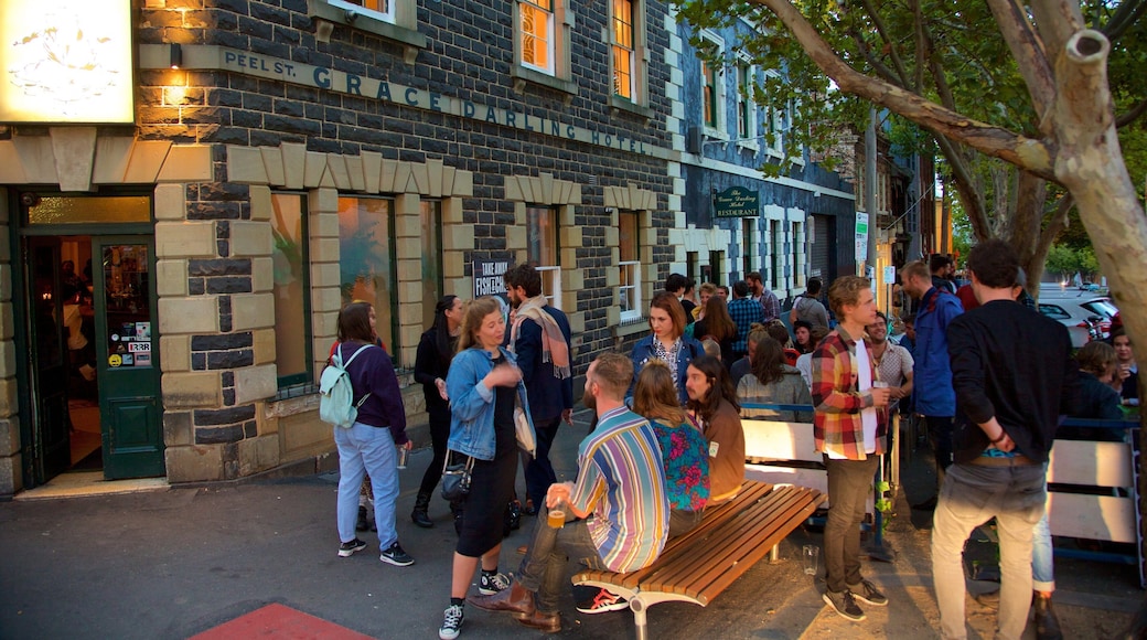 Collingwood showing night scenes as well as a large group of people