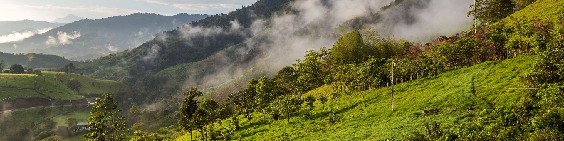 Landscape with clouds, jungles, mountains and crops Andes, Ecuador